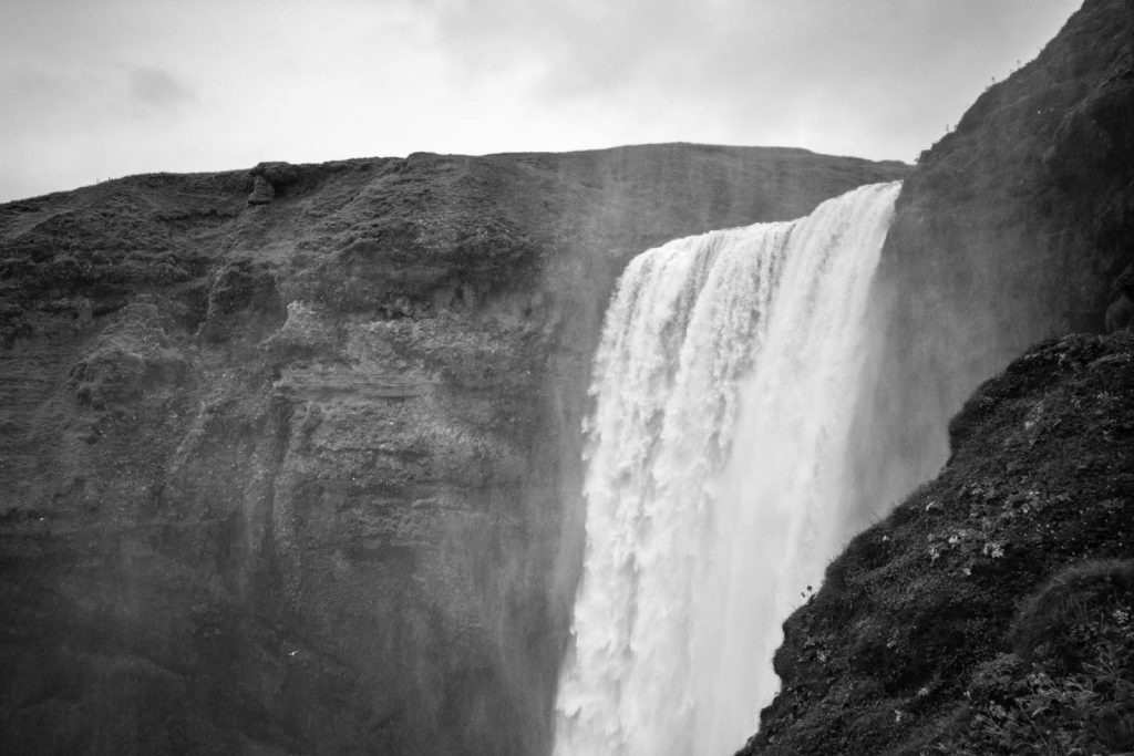 large waterfall plunging over the edge