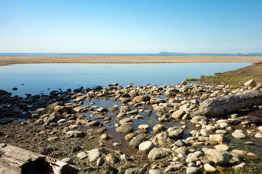 beach lagoon with rocks