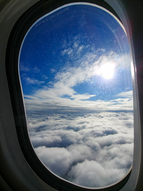 clouds outside plane window